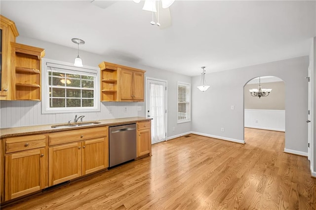 412 Gray Fox Dr, Canton, GA 30114 - kitchen with stainless steel dishwasher, open shelves, arched walkways, and light countertops