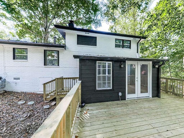 exterior space featuring french doors and a wooden deck