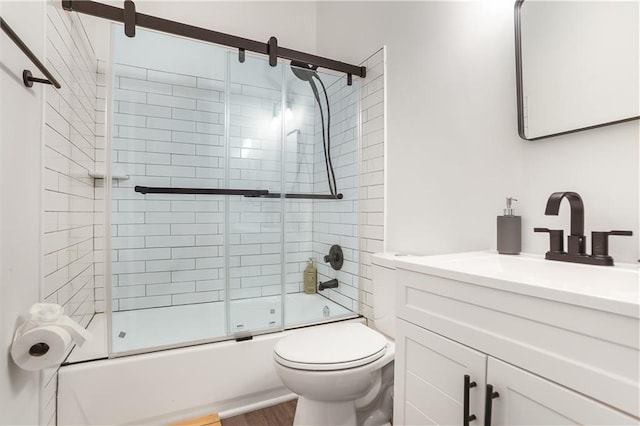 3675 Peachtree Rd NE Unit 24, Atlanta, GA 30319 - full bath featuring vanity, combined bath / shower with glass door, and wood finished floors