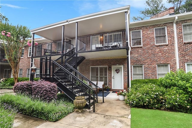 3675 Peachtree Rd NE Unit 24, Atlanta, GA 30319 - view of property with stairs