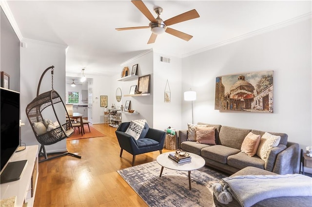 3675 Peachtree Rd NE Unit 24, Atlanta, GA 30319 - living room with a ceiling fan, wood finished floors, and ornamental molding