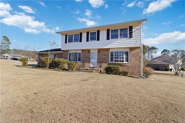 view of front of home featuring a front lawn