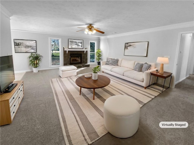 living area with ornamental molding, a fireplace with raised hearth, light carpet, and baseboards