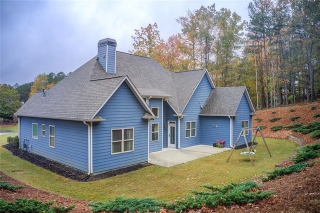 401 Night Hawk Ct, Canton, GA 30114 - back of house featuring a patio, roof with shingles, a lawn, and a chimney