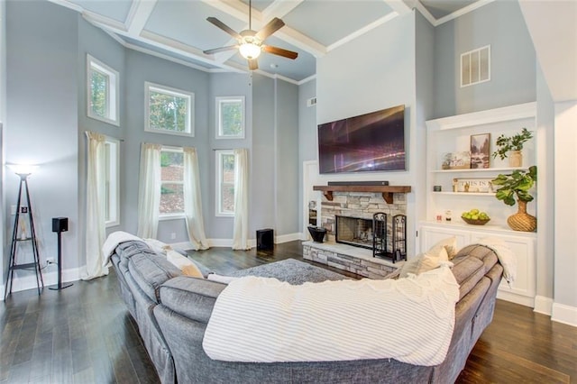 401 Night Hawk Ct, Canton, GA 30114 - living room with a high ceiling, ceiling fan, dark wood-style flooring, coffered ceiling, and a stone fireplace