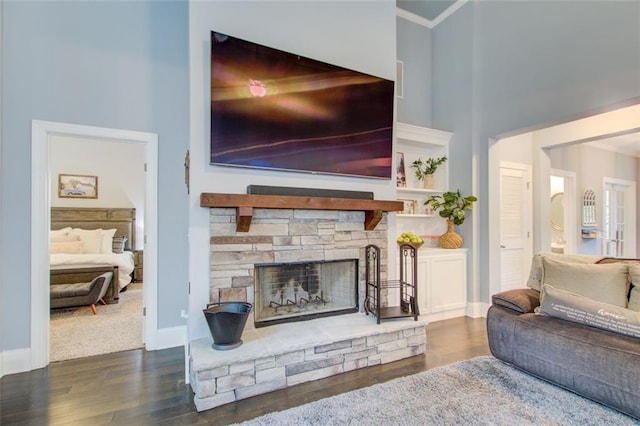 401 Night Hawk Ct, Canton, GA 30114 - living room featuring wood finished floors, a fireplace, crown molding, and baseboards