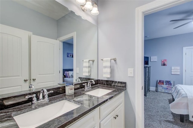 401 Night Hawk Ct, Canton, GA 30114 - ensuite bathroom featuring double vanity, ceiling fan, and baseboards