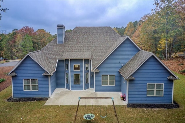 401 Night Hawk Ct, Canton, GA 30114 - rear view of property with a patio area, a chimney, a lawn, and roof with shingles