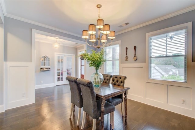 401 Night Hawk Ct, Canton, GA 30114 - dining area featuring a chandelier, dark wood-style flooring, wainscoting, a decorative wall, and crown molding