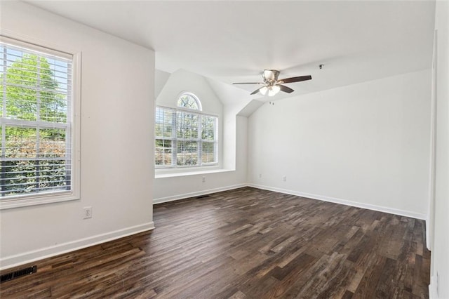 215 Morris Ln, Woodstock, GA 30188 - empty room featuring plenty of natural light, ceiling fan, and dark wood-style flooring