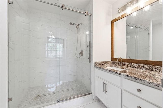 215 Morris Ln, Woodstock, GA 30188 - full bath with a marble finish shower, vanity, and marble look tile flooring