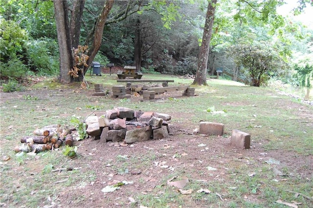 30C River Forest Pl, Suches, GA 30572 - view of yard featuring an outdoor fire pit and a view of trees