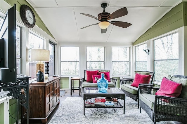 sunroom featuring ceiling fan and lofted ceiling