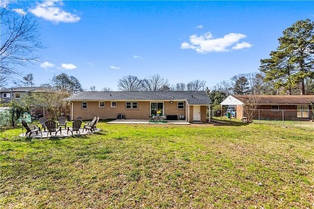 back of house with a yard, a patio area, and fence