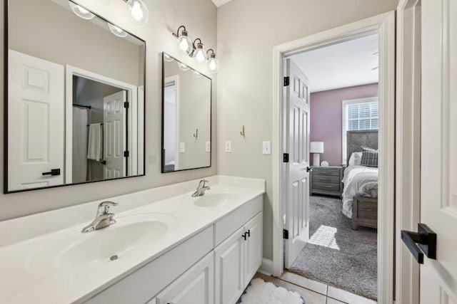 bathroom featuring tile patterned floors and vanity