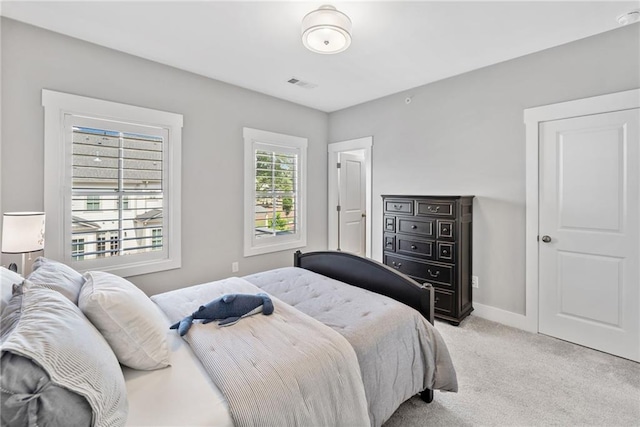 1104 Thomas St, Woodstock, GA 30188 - bedroom featuring light carpet and baseboards