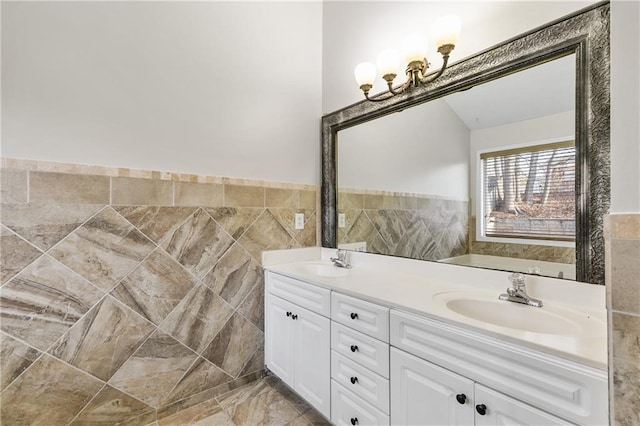 bathroom with tile walls and vanity