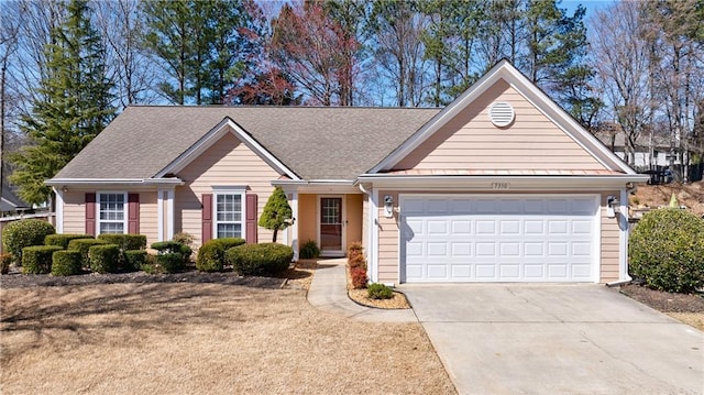 single story home with a garage, driveway, and a shingled roof