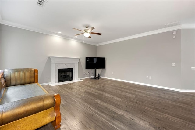 2994 Meadow Church Rd, Suwanee, GA 30024 - living room with ceiling fan, wood finished floors, a premium fireplace, baseboards, and crown molding