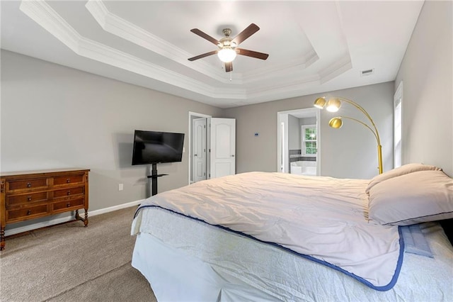 2994 Meadow Church Rd, Suwanee, GA 30024 - carpeted bedroom with a raised ceiling, crown molding, baseboards, a ceiling fan, and ensuite bath