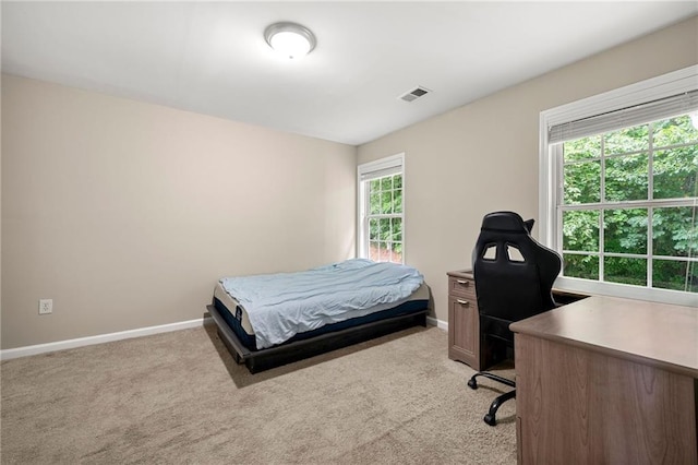2994 Meadow Church Rd, Suwanee, GA 30024 - bedroom with light carpet, baseboards, and a desk