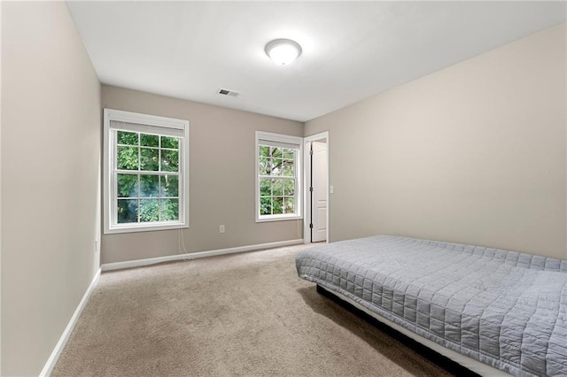 2994 Meadow Church Rd, Suwanee, GA 30024 - carpeted bedroom featuring baseboards