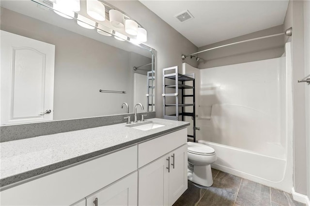 2994 Meadow Church Rd, Suwanee, GA 30024 - full bath featuring toilet, vanity,  shower combination, and wood finished floors