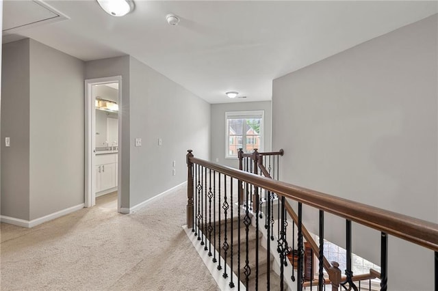 2994 Meadow Church Rd, Suwanee, GA 30024 - hallway featuring an upstairs landing, attic access, light carpet, and baseboards