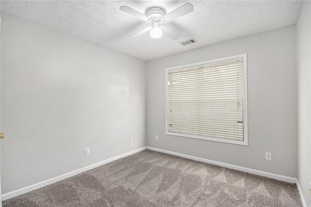 104 Terrapin Ct, Carrollton, GA 30116 - carpeted empty room with a ceiling fan, a textured ceiling, and baseboards