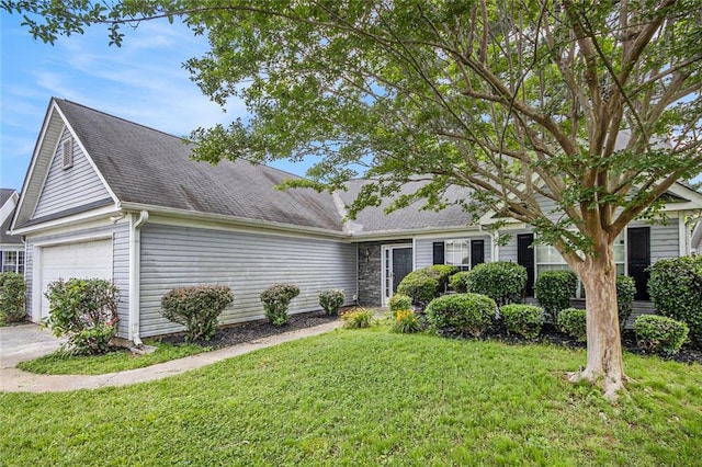 104 Terrapin Ct, Carrollton, GA 30116 - view of front of home with a front yard, a garage, and roof with shingles