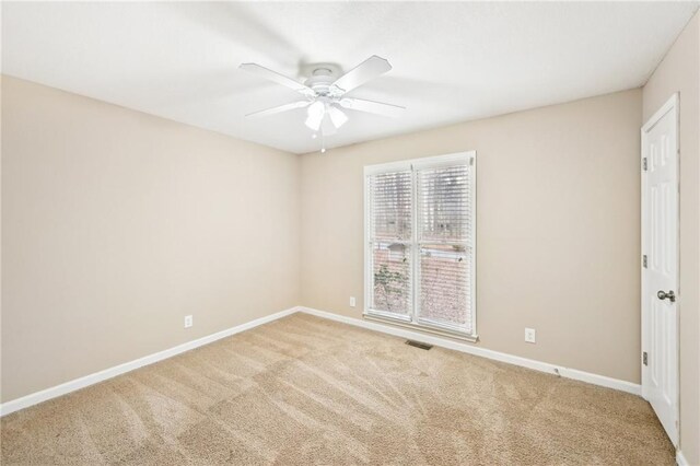105 Spring Forest Way, Sharpsburg, GA 30277 - carpeted empty room with ceiling fan, visible vents, and baseboards