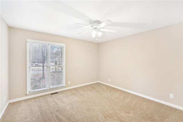 105 Spring Forest Way, Sharpsburg, GA 30277 - spare room with carpet, a ceiling fan, and baseboards