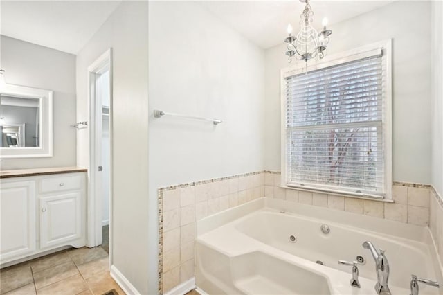 105 Spring Forest Way, Sharpsburg, GA 30277 - full bath featuring tile patterned flooring, a notable chandelier, vanity, and a whirlpool tub