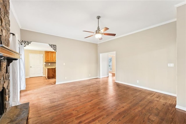 105 Spring Forest Way, Sharpsburg, GA 30277 - unfurnished living room with ornamental molding, light wood-style floors, a fireplace, and a ceiling fan