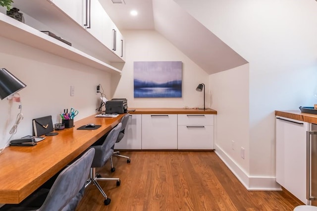 office with light hardwood / wood-style floors