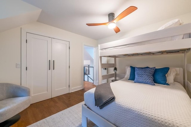 bedroom featuring dark wood-type flooring and ceiling fan