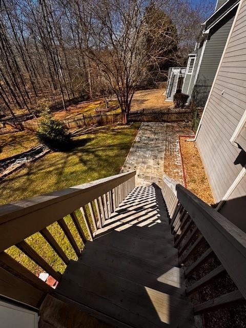 deck featuring a lawn