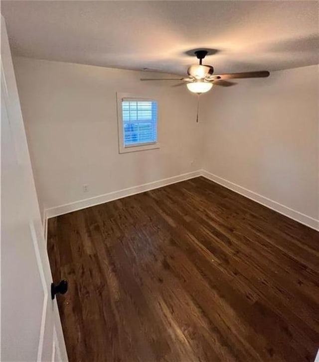 2022 Detroit Ave, Atlanta, GA 30314 - unfurnished room featuring a ceiling fan, dark wood-style flooring, and baseboards