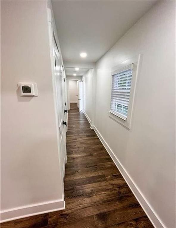 2022 Detroit Ave, Atlanta, GA 30314 - hallway with dark wood-style floors and baseboards