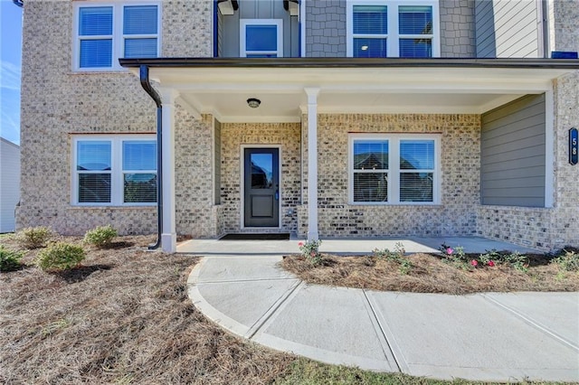 entrance to property with covered porch