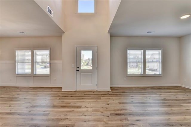 foyer with light hardwood / wood-style flooring