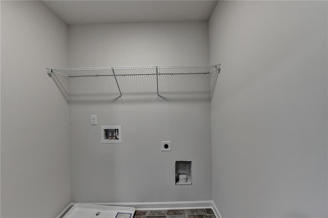 washroom with washer hookup and hookup for an electric dryer