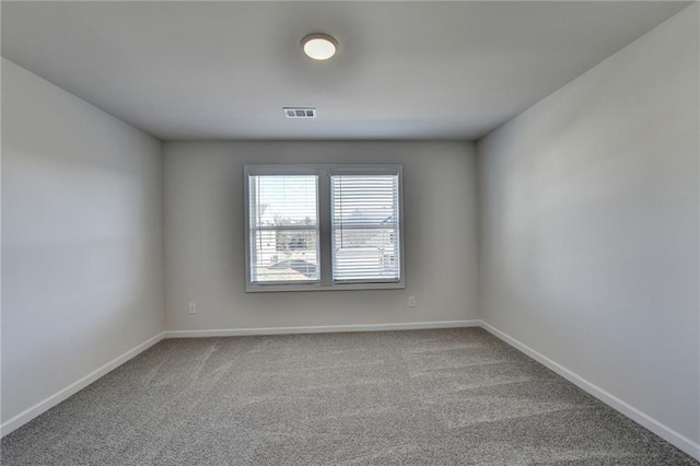 unfurnished room with carpet