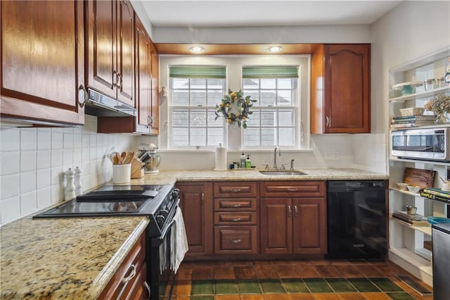 kitchen featuring stainless steel microwave, sink, range with electric cooktop, dishwasher, and tasteful backsplash