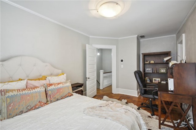 bedroom with radiator heating unit, ornamental molding, and parquet floors