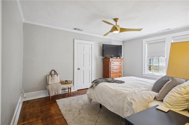 bedroom with ceiling fan and crown molding