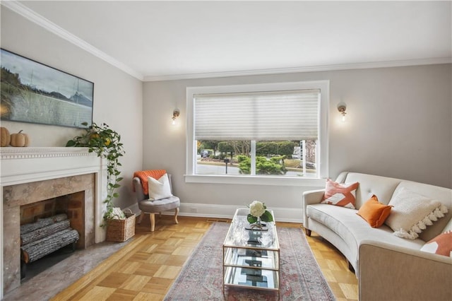 living room with a high end fireplace, ornamental molding, and light parquet flooring