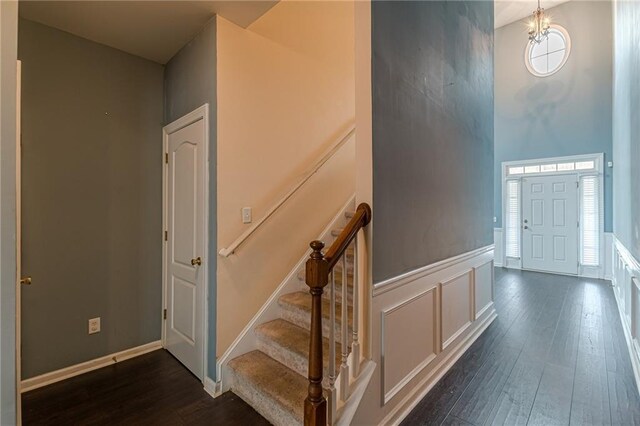 corridor featuring dark wood-type flooring