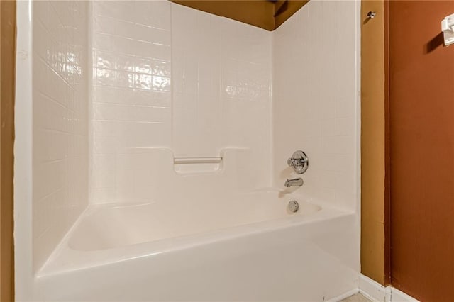 full bathroom with shower / tub combination