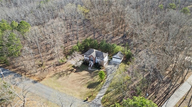 aerial view featuring a view of trees